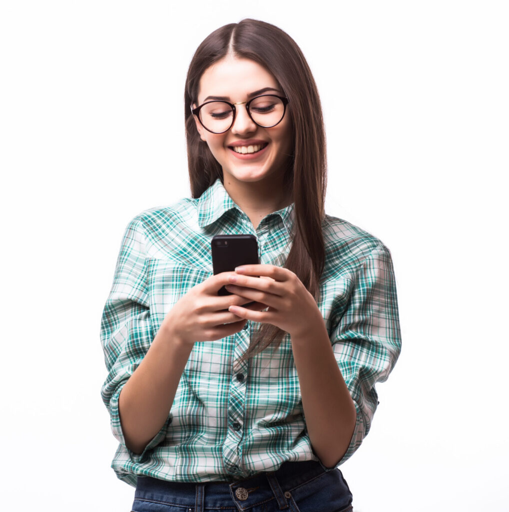 Beauty woman using and reading a smart phone on a white background